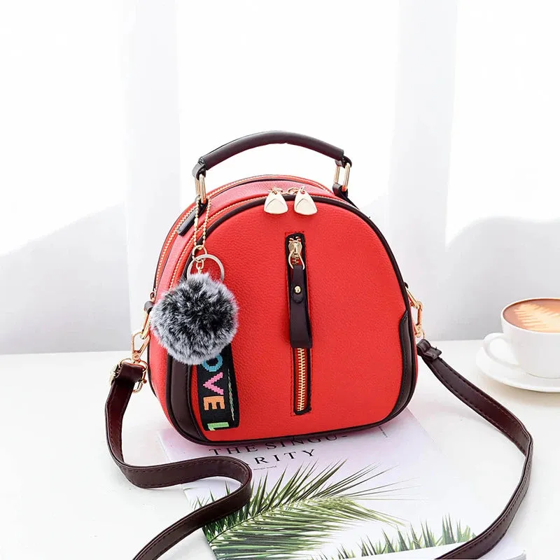 Chic Black Round Tote with Fur Charm