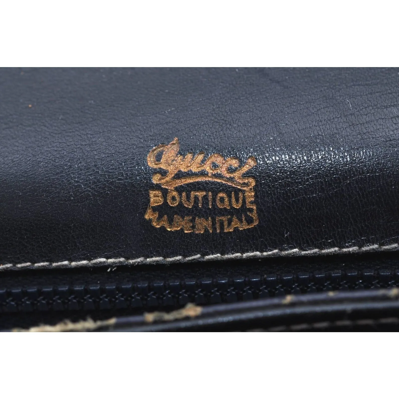 Gucci 60's navy leather saddle bag with gold logo clasp
