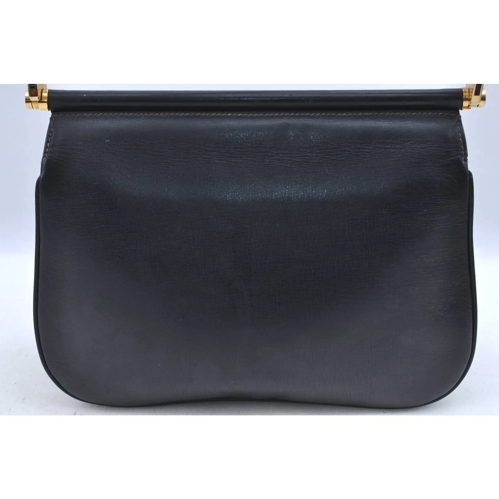 Gucci 60's navy leather saddle bag with gold logo clasp